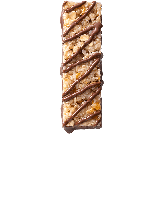 Detalle de barritas de cereales, coco y chocolate con leche Corny